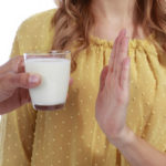 45892007 – woman with milk allergy isolated