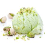 scoop of pistachio ice cream with pistachios
