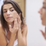 Woman taking care of her skin