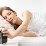 Girl is having trouble waking up.