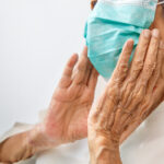 Elderly woman wearing a mask to protect from coronavirus covid-19