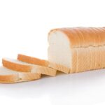 Sliced loaf of bread isolated on white