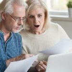 Aged married couple received unpaid bills and taxes feels stressed