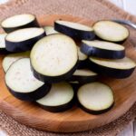Chopped eggplants on a cutting board