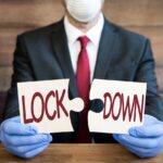 A Coronavirus Lockdown concept with the word Lockdown on a jigsaw puzzle