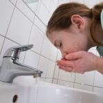 Girl Washing Mouth